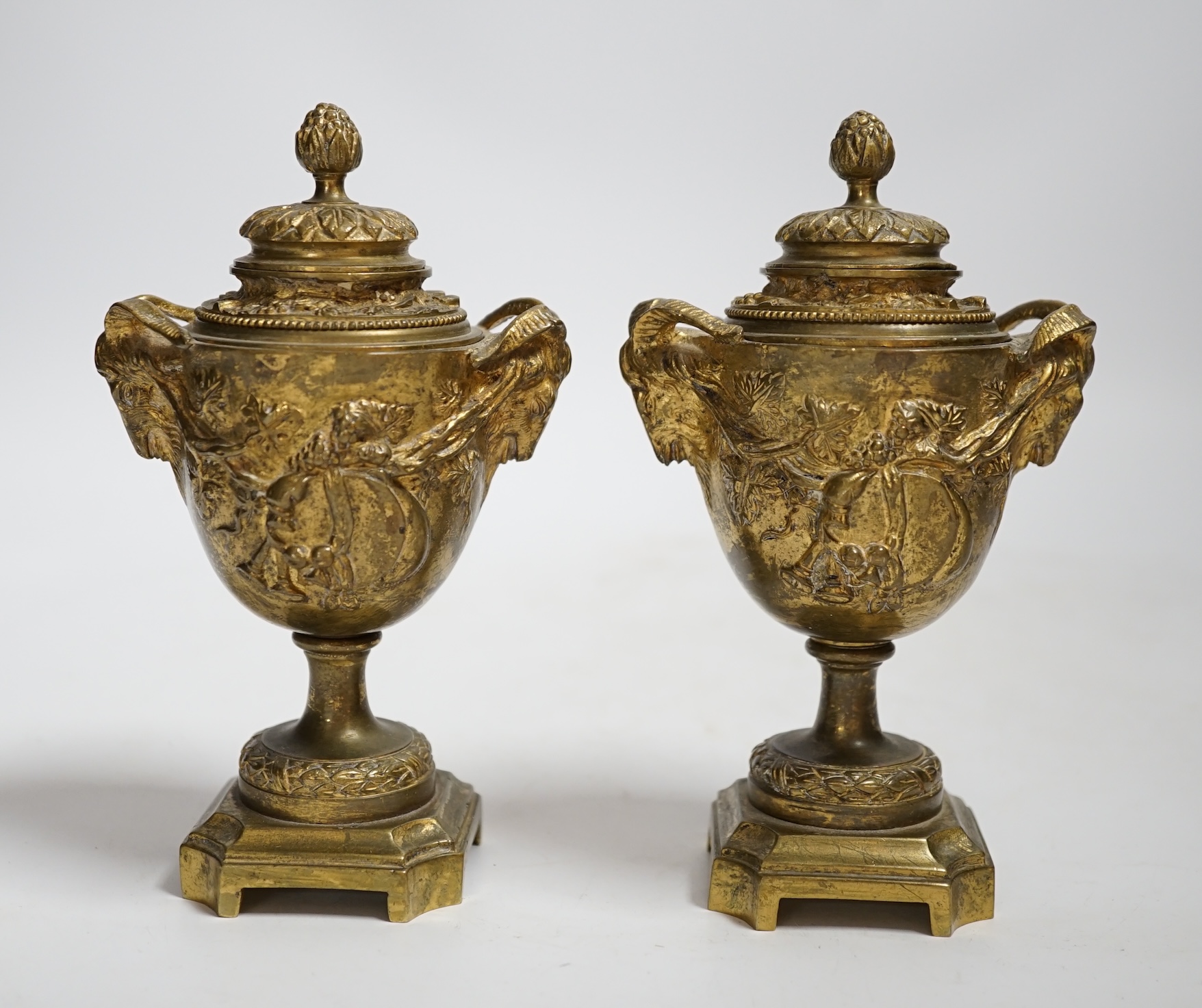 A pair of 19th century brass lidded vases, 15cm
